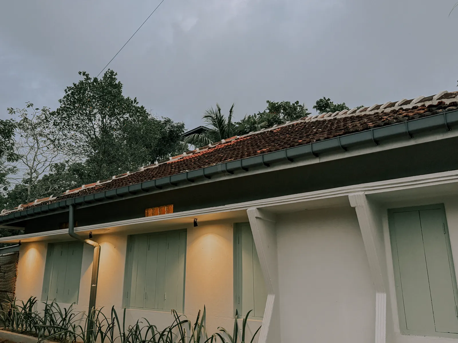 Completed exterior of Kickin’ Surf Lodge after renovation and design