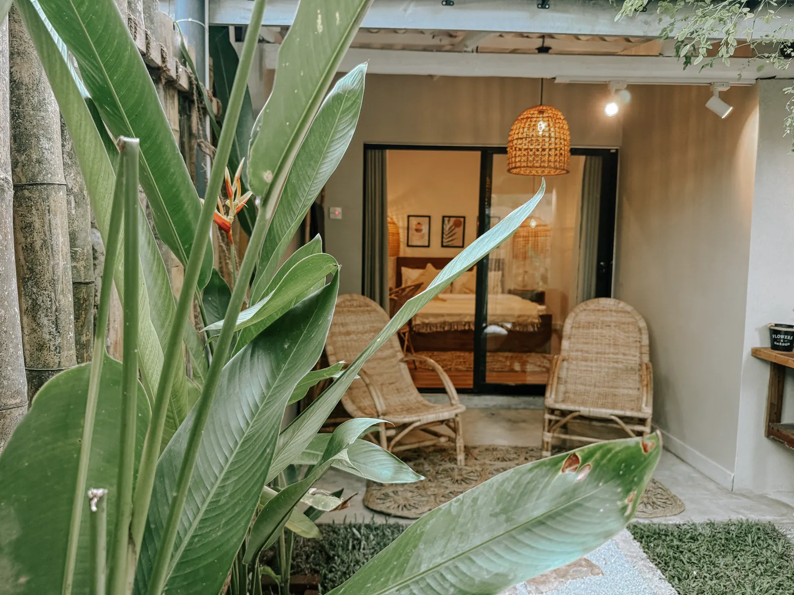 Private tropical garden entrance outside a Kickin’ Surf Lodge guest room