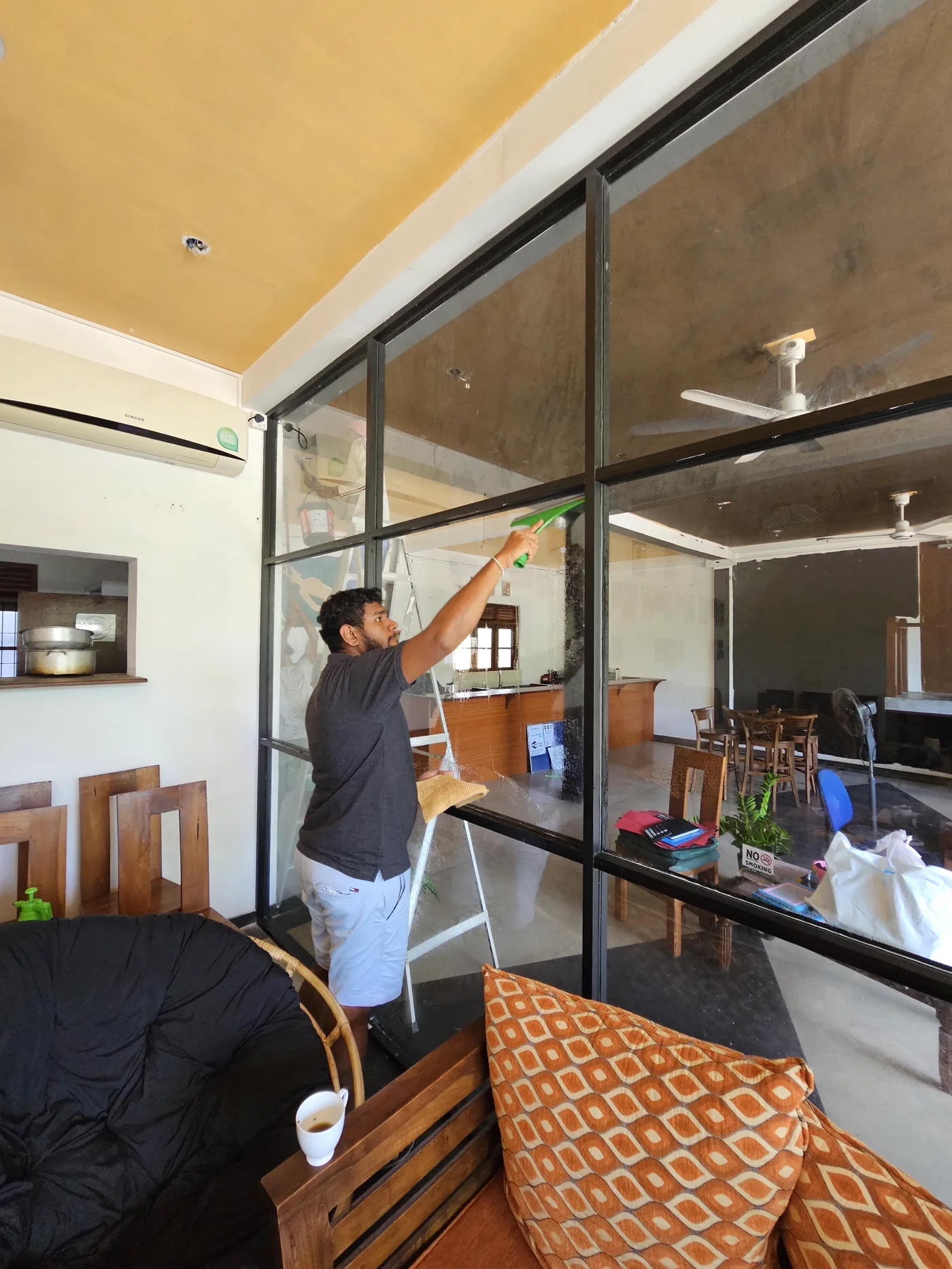 Hands-on cleaning during the Sugar Hostel transformation